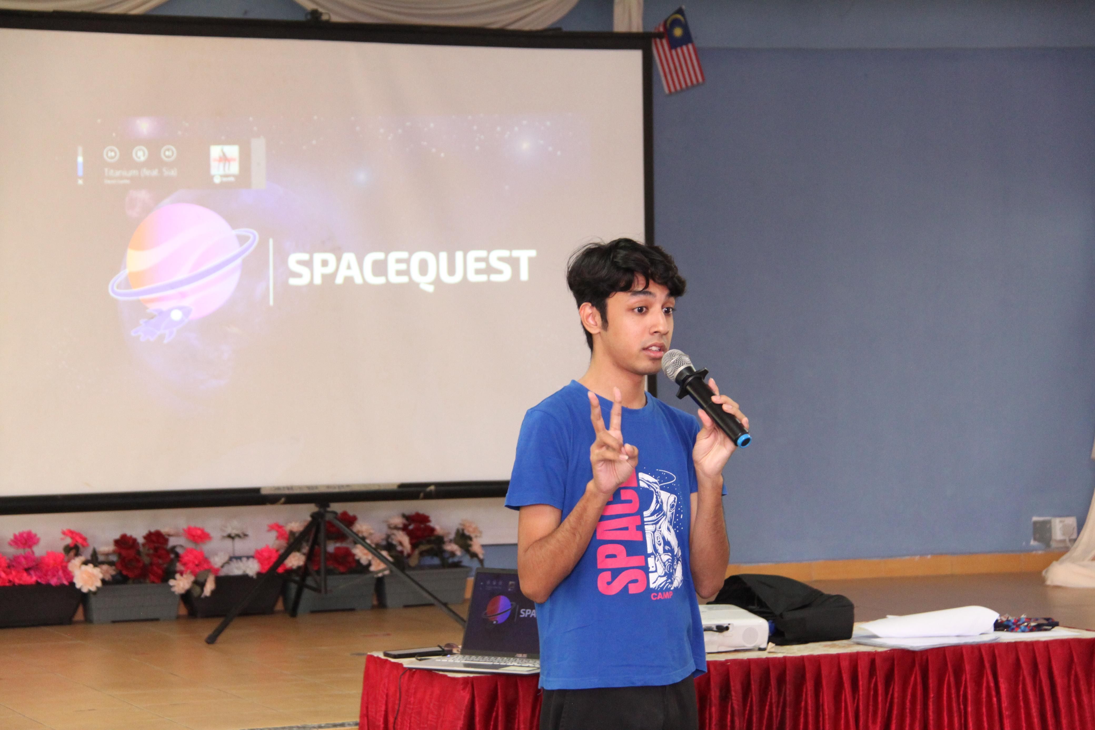 arric gomez presenting for spacequest