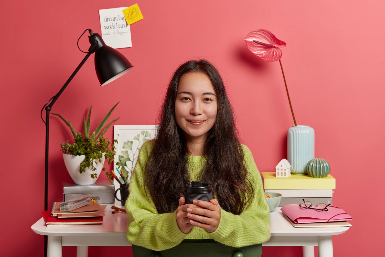 a woman in green sweater