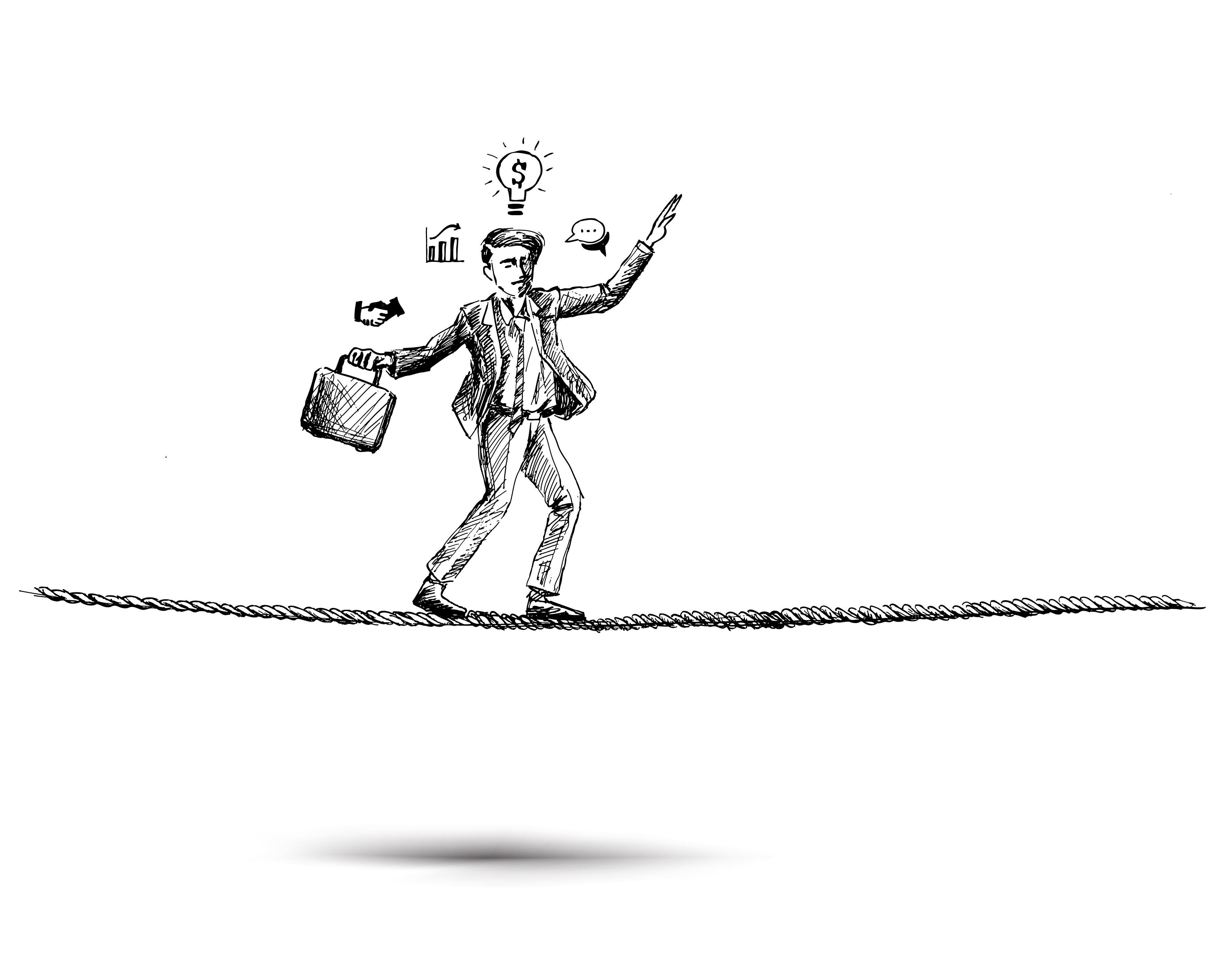 man walking on a thin rope