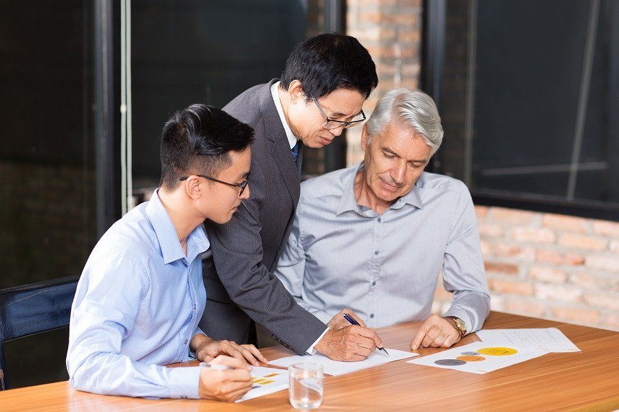 An male employee onboarding  a senior leader