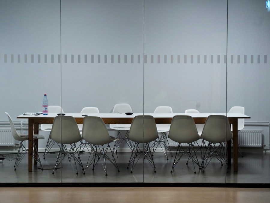 open-plan office sitting arrangement 