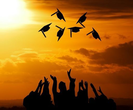 graduation caps, sunset, silhouette