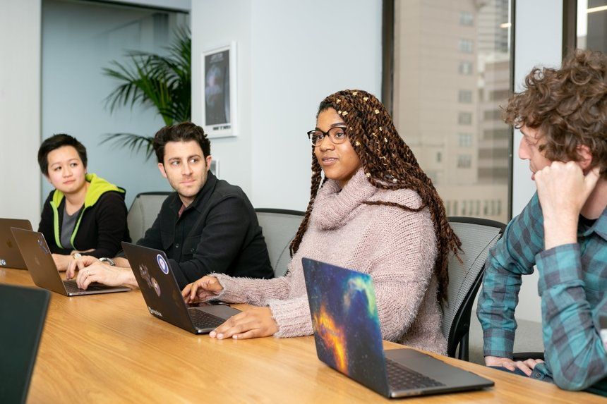 diverse group of employees working at desk