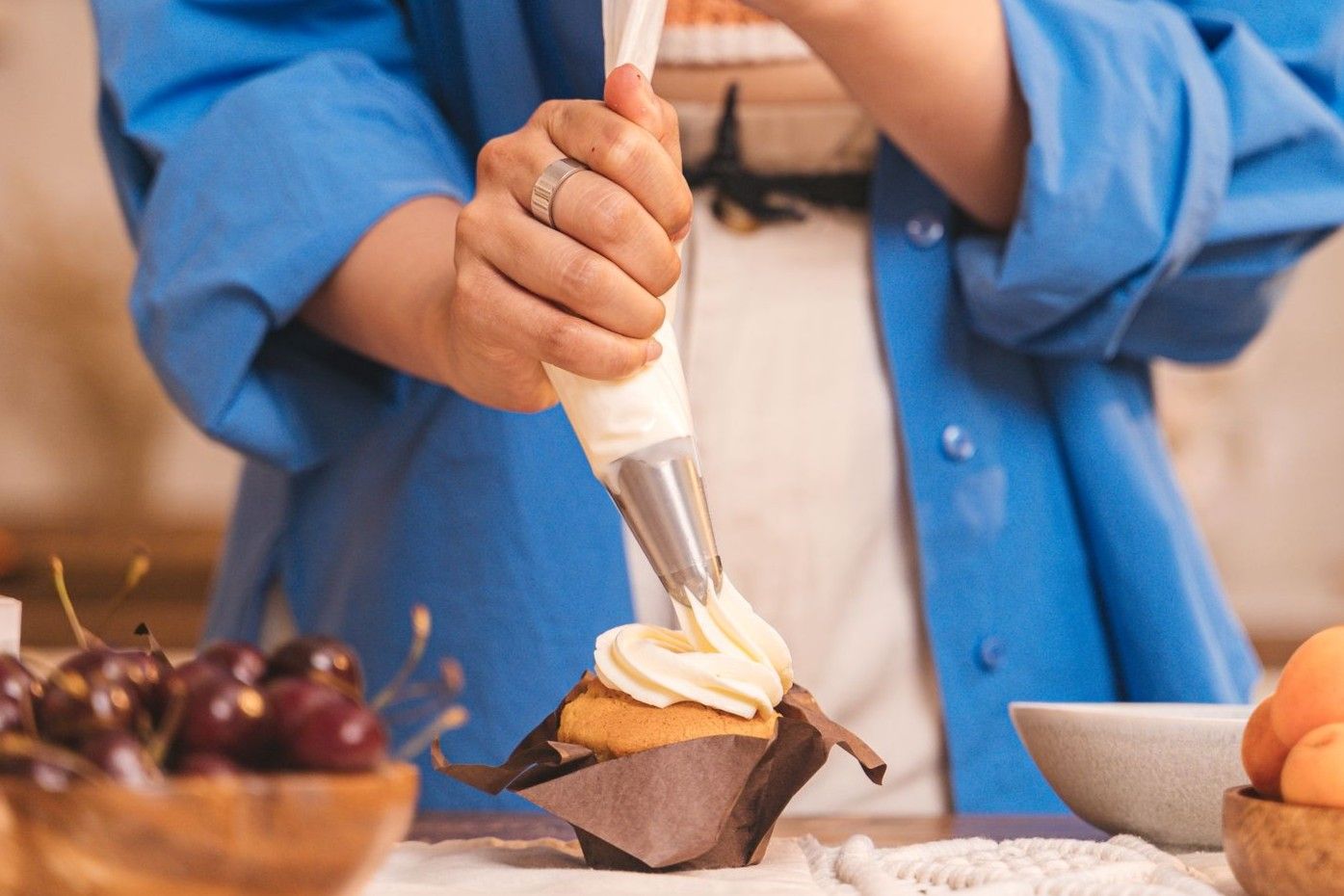 decorating a cupcake