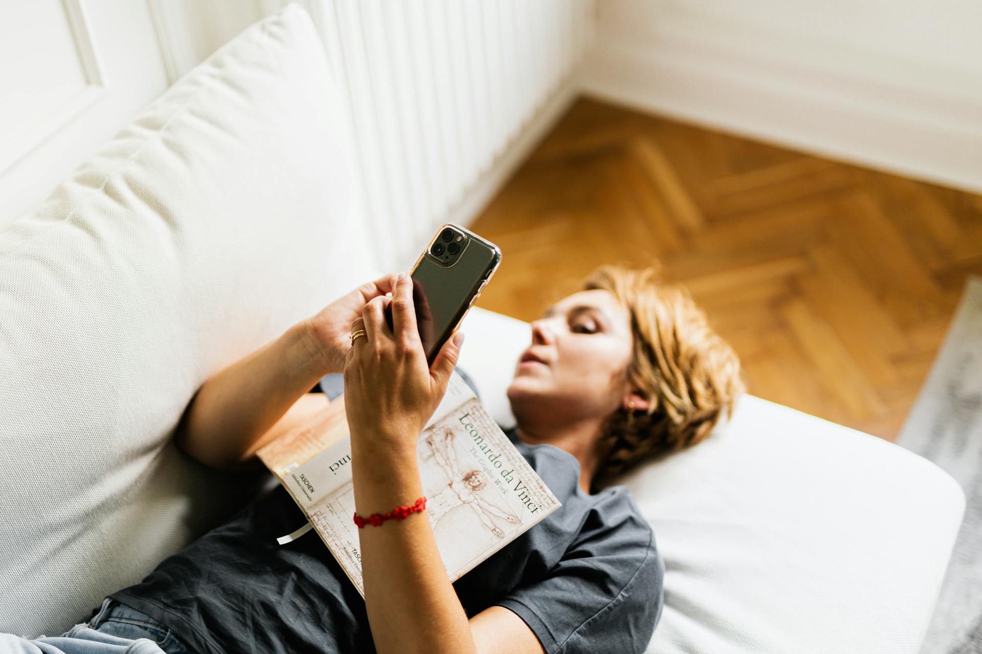 woman lying on a sofa