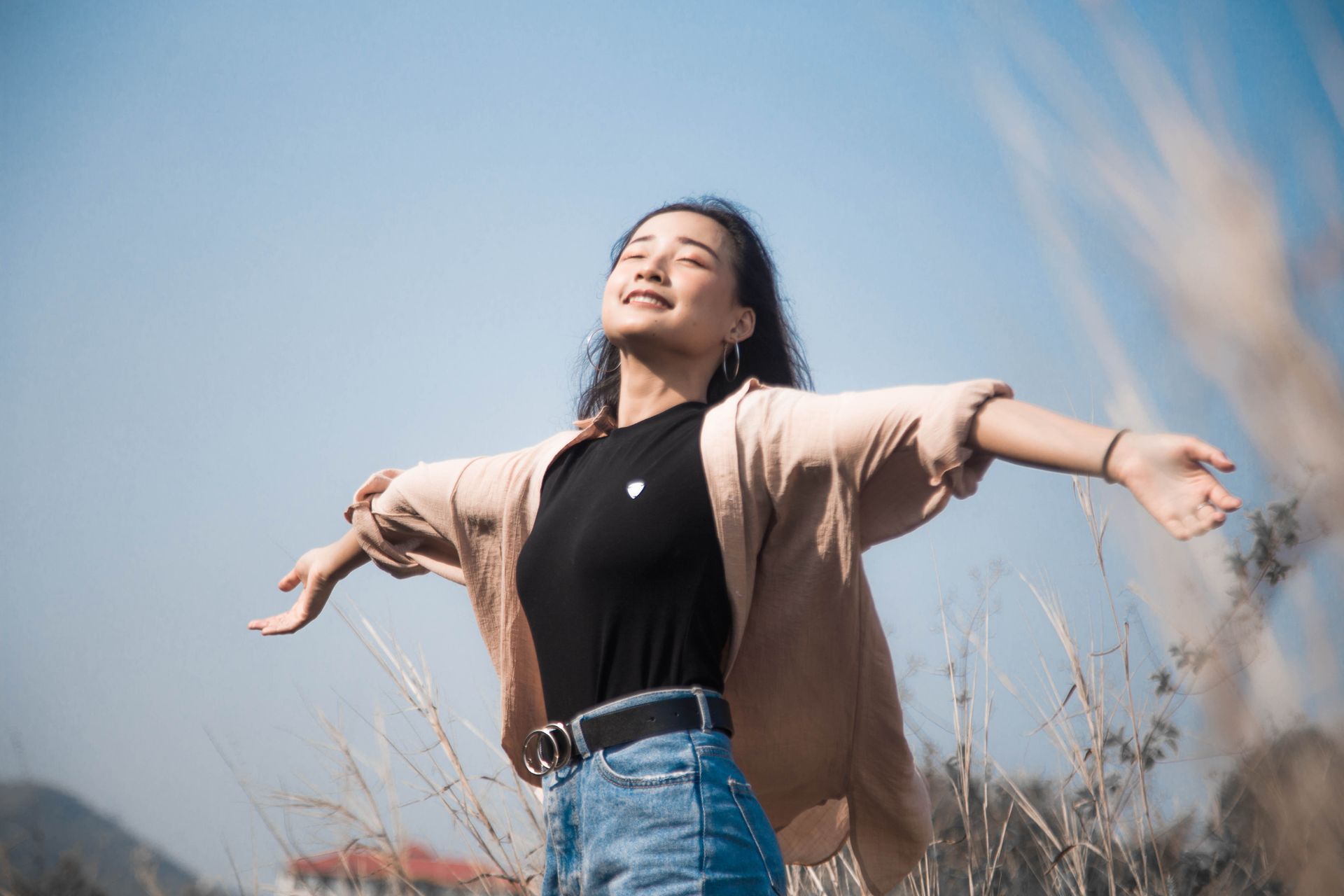 A woman in a natural field
