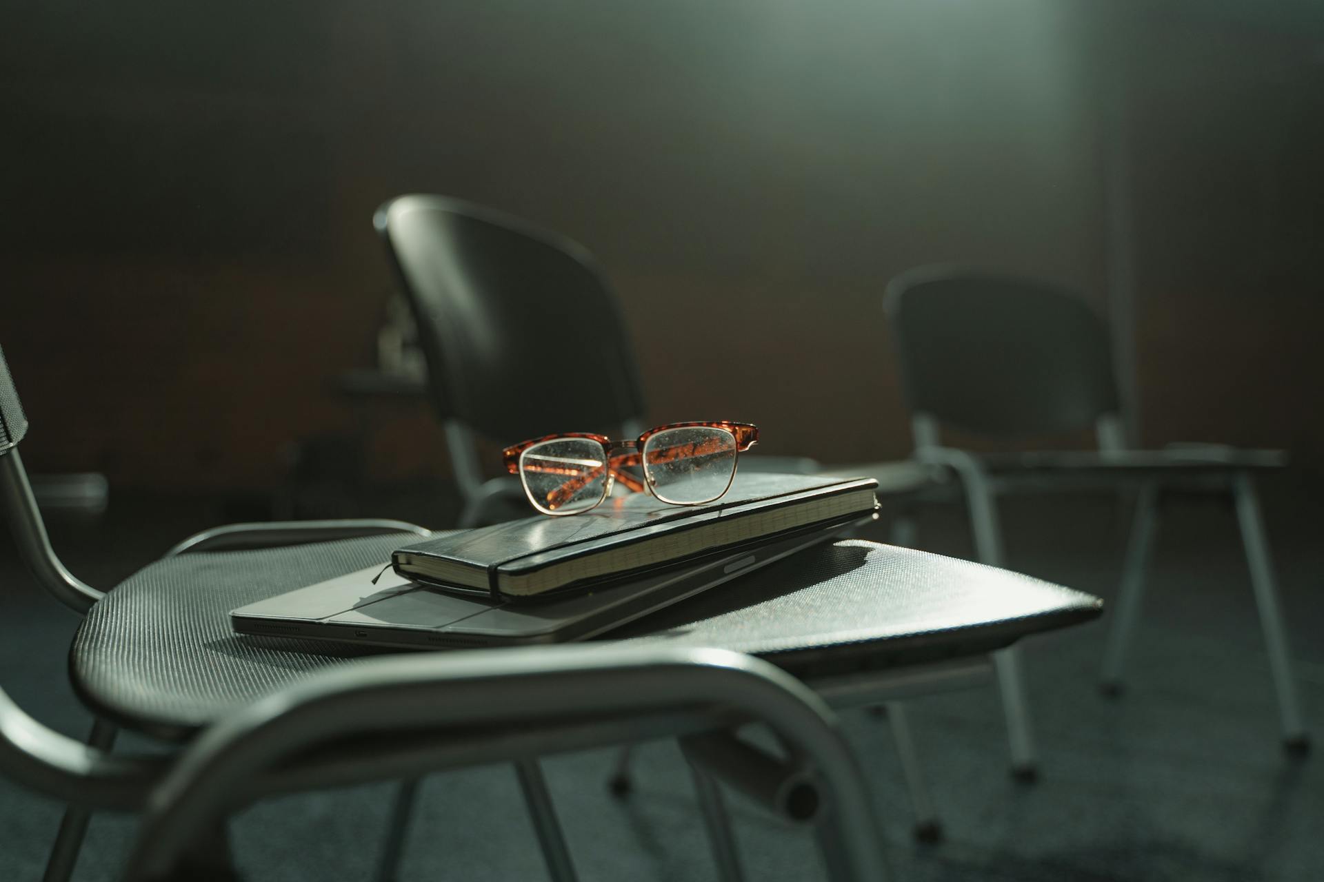 Eyeglasses on Black Chair