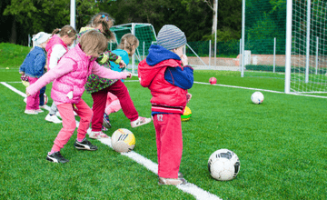 Children playing soccer