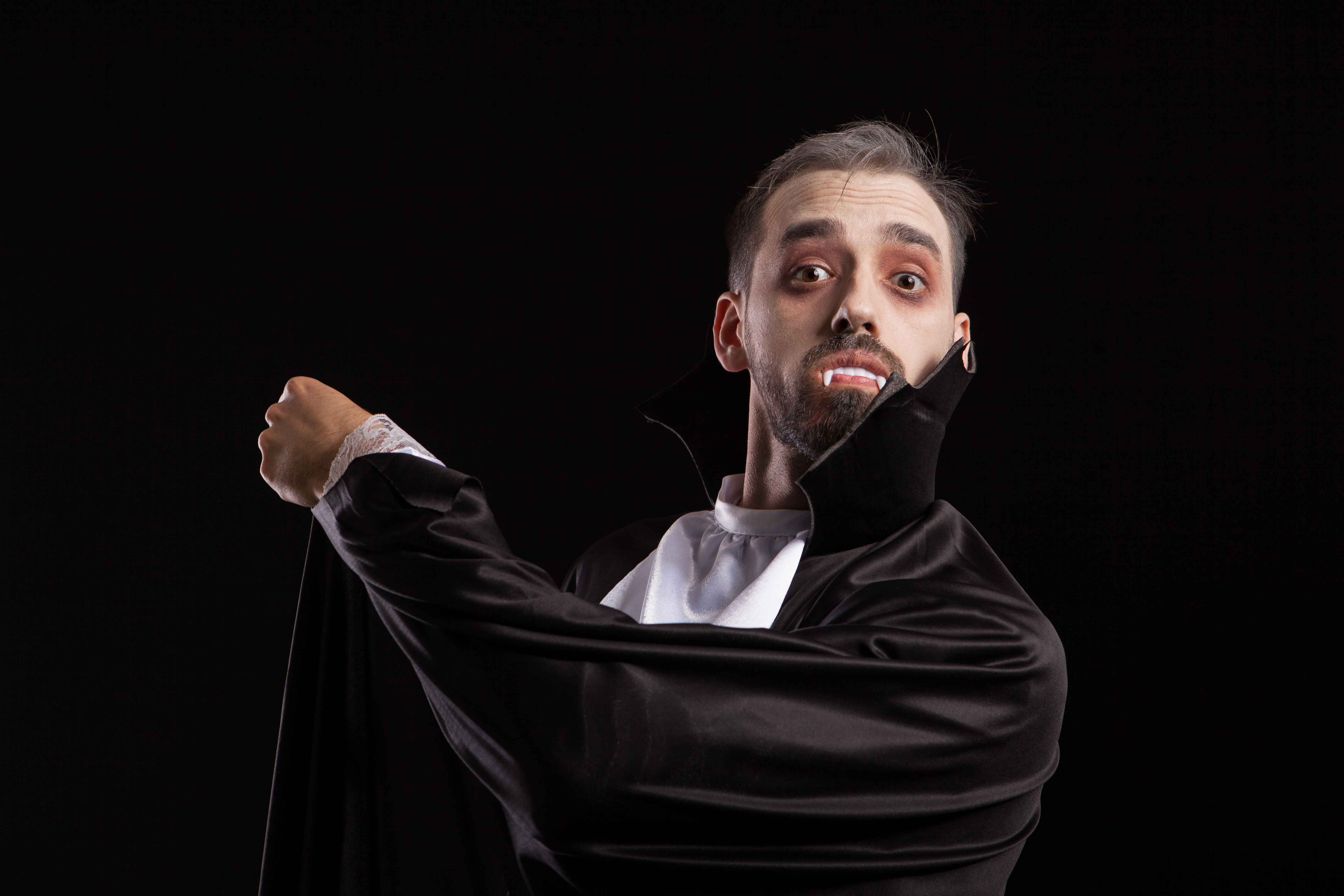 man acting as a vampire