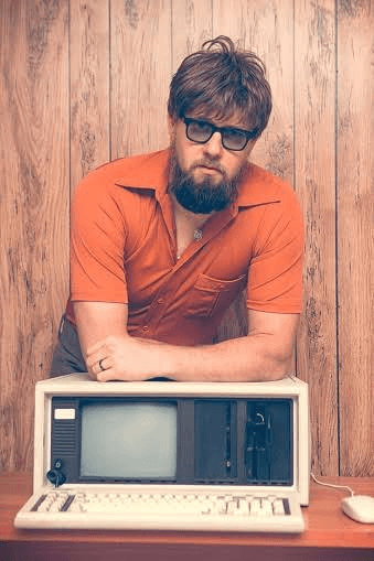 man wearing orange top