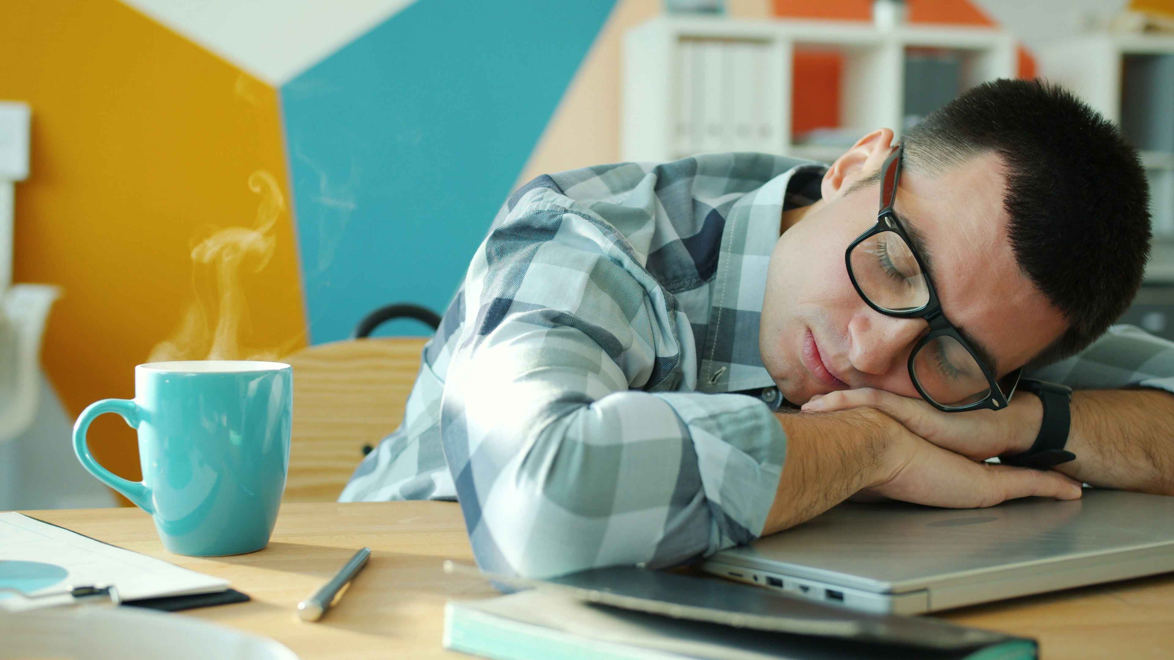 man sleeping at work
